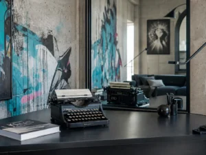 Picture showing a typewriting reflected in a mirror, representing the question about how much AIs can reproduce text in the style of authors
